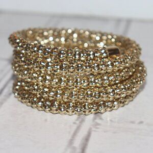 Beautiful gold bangle coil bracelet *fits most wrists sizes*